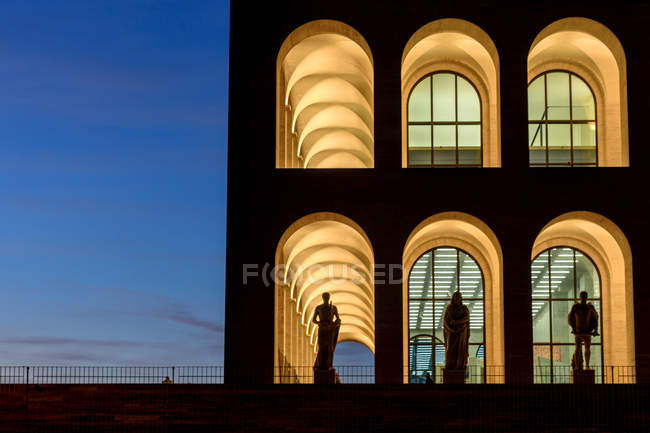 Palazzo della Civilta Italiana Palace or square Colosseum at dusk, EUR, Rome, Lazio, Italy, Europe — стоковое фото
