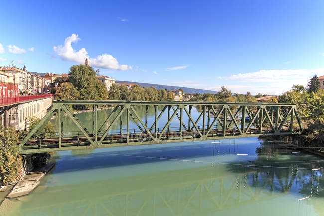 Dora Baltea River and Ivrea cityscape, Ivrea, Piedmont, Italy, Europe — стокове фото
