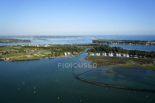 View of the Venice Lagoon from the helicopter, Vignole and Certosa island in the foreground and Treporti and Lido and its port in the background, Venice, Italy, Europe — Stock Photo
