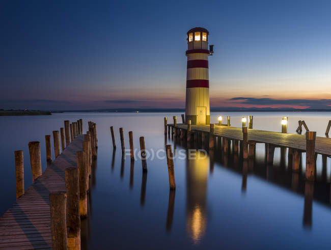 Podersdorf am See on the shore of Lake Neusiedl. The lighthouse in the domestic port, the icon of Podersdorf and Lake Neusiedl. The landscape around the lake is an UNESCO World Heritage. Europe, Central Europe, Austria, Burgenland, September — Stock Photo
