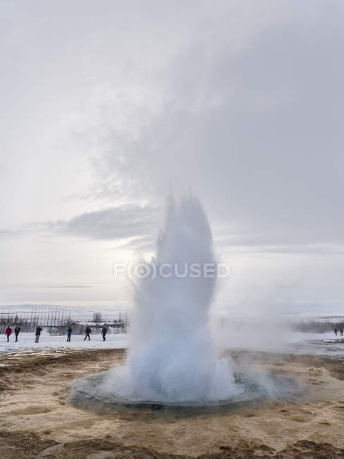 The geothermal area Haukadalur part of the touristic route Golden Circle during winter. Geysir Strokkur.   europe, northern europe, iceland, March — Stock Photo