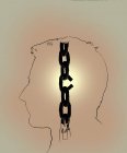Breaking chain link inside man profile — Stock Photo