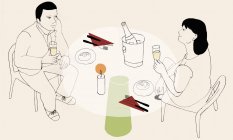 Пара пьющих шампанское за обеденным столом — стоковое фото