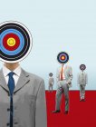 Businessmen with targets for heads — Stock Photo