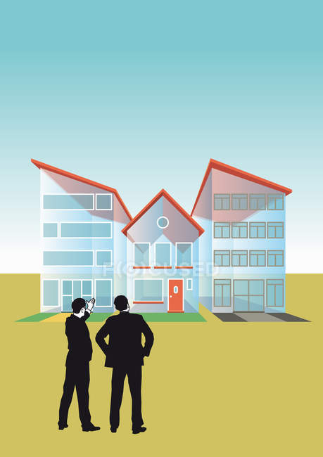 Two businessmen talking at transparent houses — Stock Photo