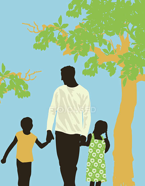 Father walking in park with children — Stock Photo