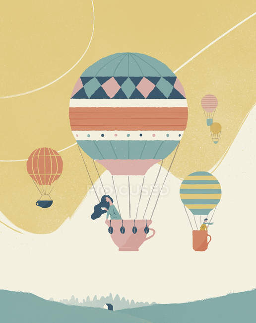 Ballonfahrt mit Heißluftballon in Tassenform — Stockfoto