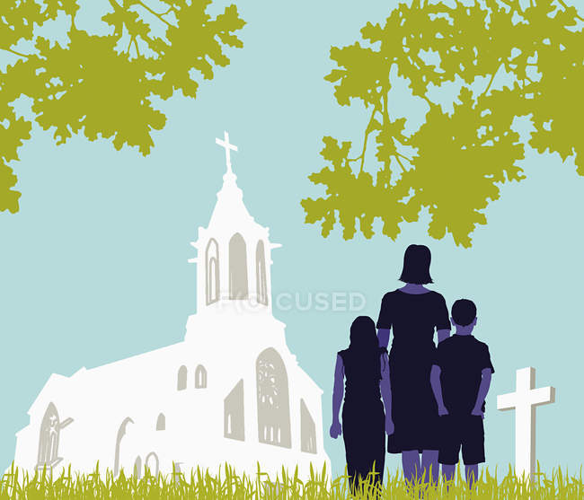 Visite familiale cimetière près de l'église — Photo de stock