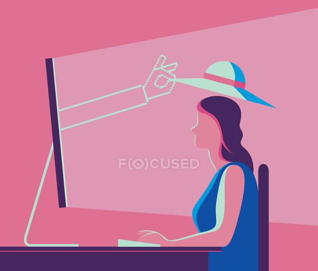 Mão emergindo da tela do computador colocando chapéu na cabeça da mulher — Fotografia de Stock