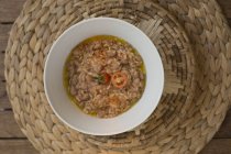 Rice soup with beans and datterini tomatoes, top view. — Stock Photo