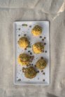 Lentil and thyme no-meatballs served on white plate. — Stock Photo