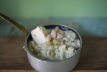 Milky rice with beans and goat toma cheese. — Stock Photo