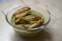 Bowl of broccoli puree and vegetables fries. — Stock Photo