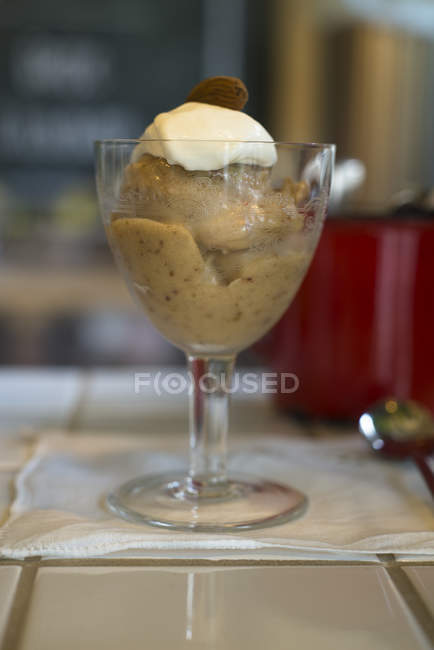 Fig and date sorbet served in glass on table. — Stock Photo