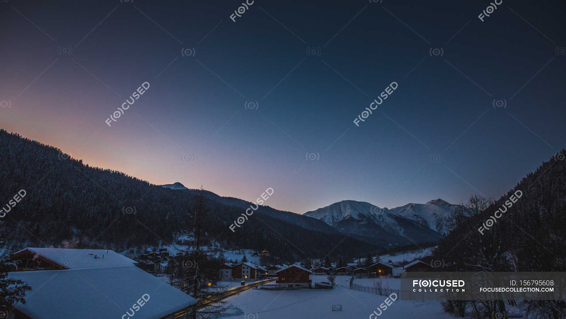 Village In Mountains At Night In Winter High Beautiful Stock