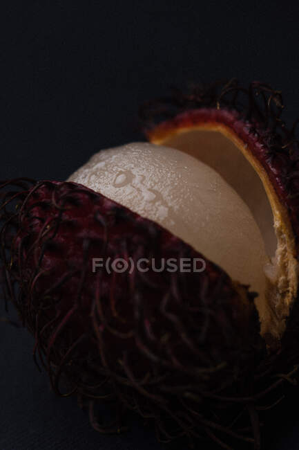 View of lychee isolated on dark background — Stock Photo