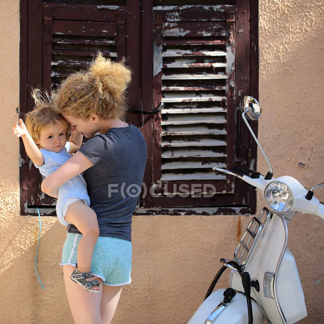 Woman with baby outdoor — Stock Photo