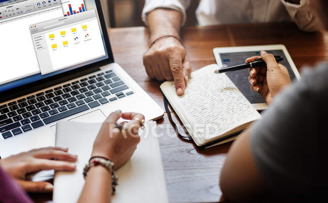 People Working with digital devices — Stock Photo