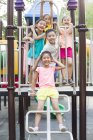 Chinese children playing in amusement park — Stock Photo