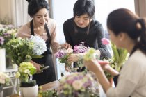 Asian women learning flower arrangement — Stock Photo