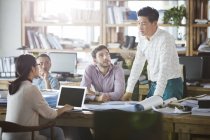 Architects discussing work in office — Stock Photo