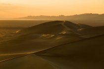 View of desert at dusk in Dunhuang, China — Stock Photo