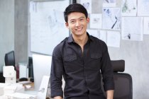 Portrait of chinese architect in office — Stock Photo
