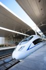 High speed bullet train on station — Stock Photo