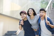 Young men and woman having fun together — Stock Photo