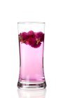 Globe amaranth tea in glass isolated on white background — Stock Photo