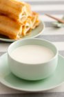 Soybean milk and fried sticks on background — Stock Photo