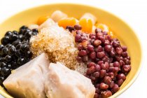 Sweet chinese food, bowl with tapioca and brown sugar — Stock Photo