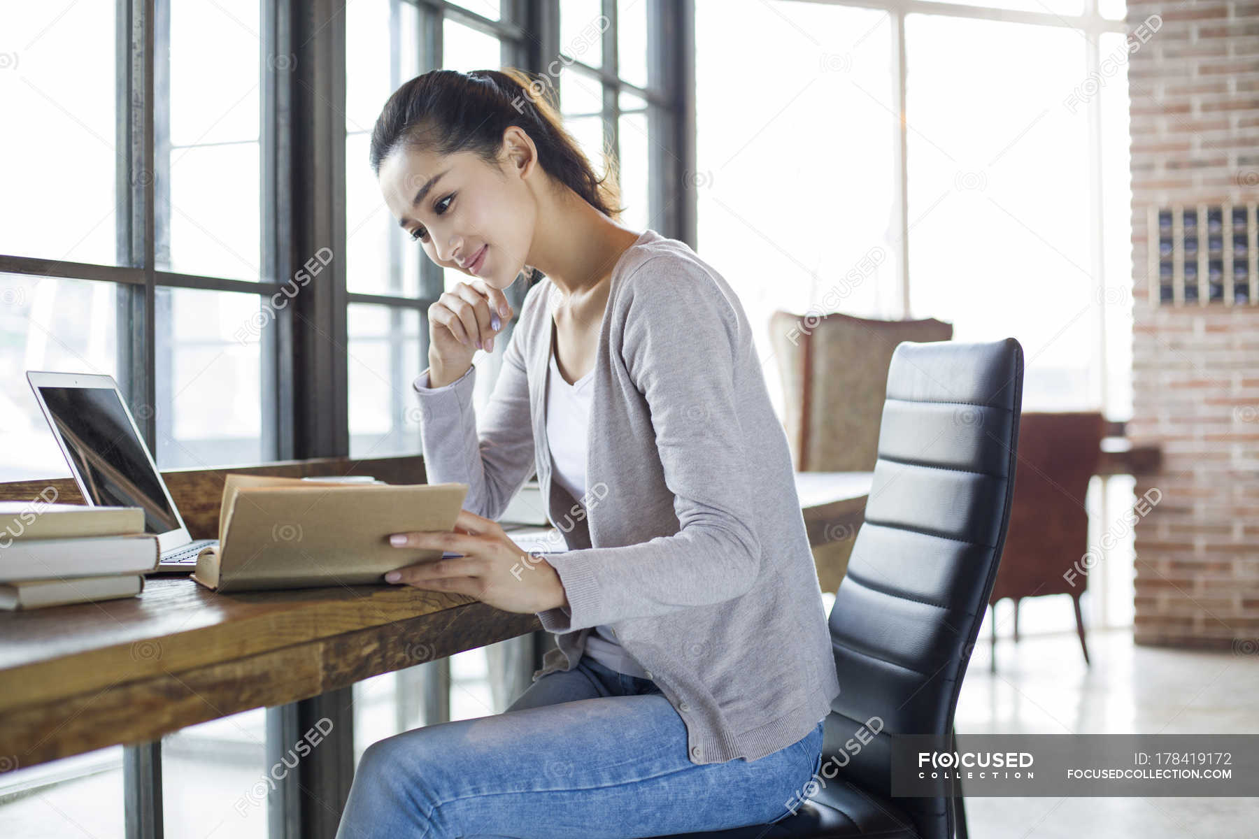 Chinese woman reading book in cafe — window, female - Stock Photo ...