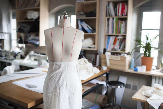 Mannequin in fashion design studio interior — Stock Photo