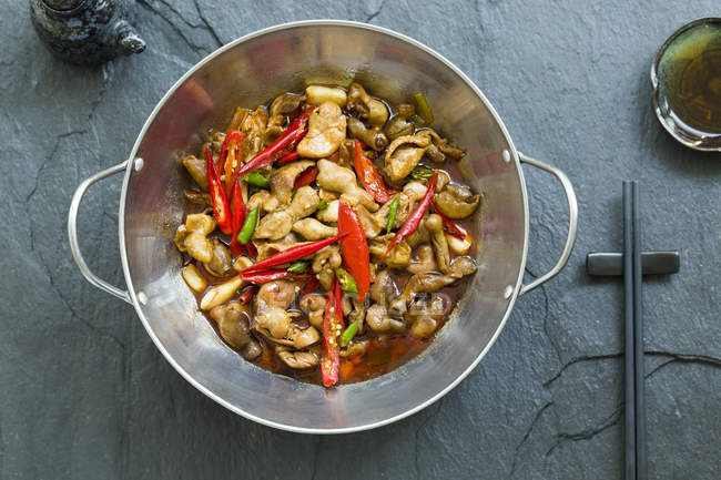 Chinese traditional griddle pork intestines meal — Stock Photo