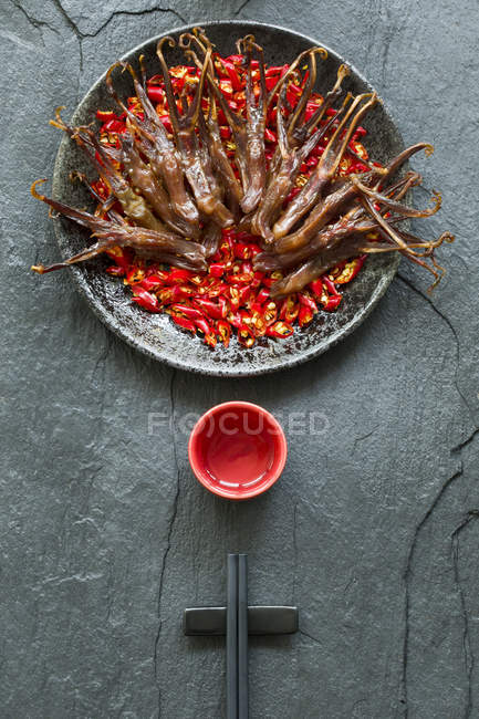 Chinese braised duck tongues meal — Stock Photo
