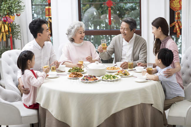 Family having Chinese New Year dinner — Stock Photo