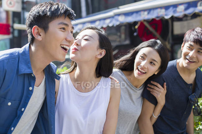 Chinese couples walking together on street — Stock Photo