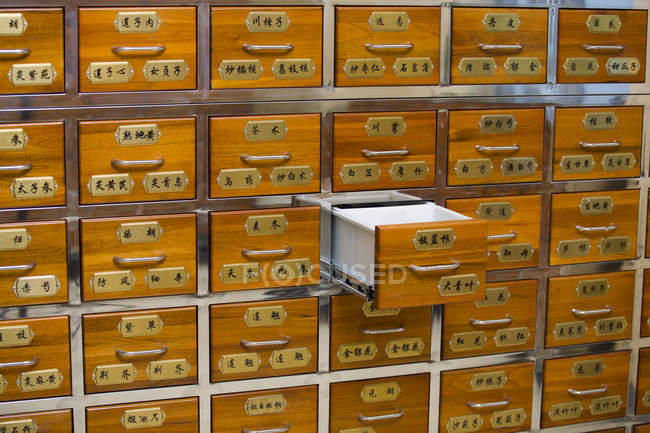 Traditional chinese medicine pharmacy drawers — Stock Photo