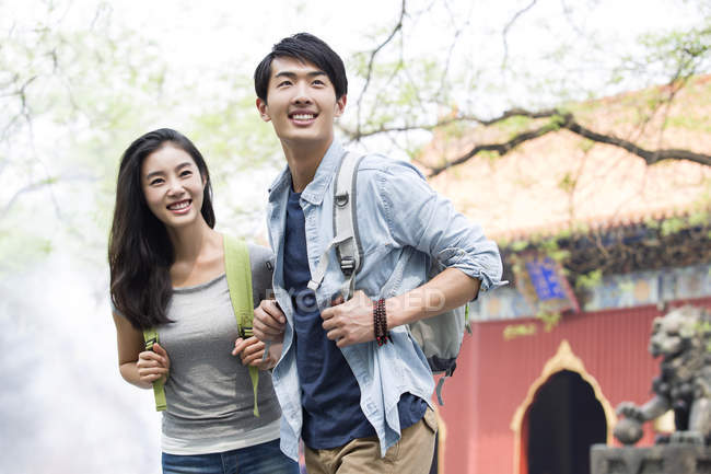 Chinese couple of tourists visiting Lama Temple — Stock Photo