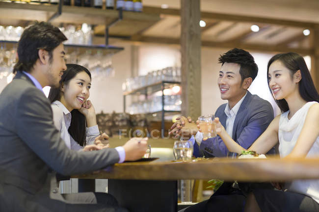 Chinese friends having dinner together — Stock Photo