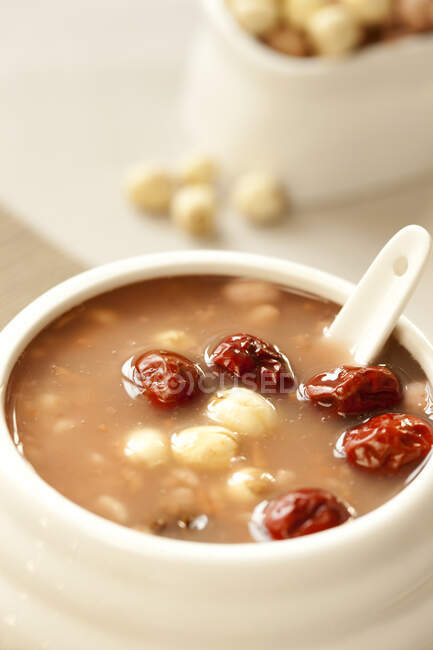 Cibo cinese, otto porridge ingrediente in ciotola con cucchiaio — Foto stock