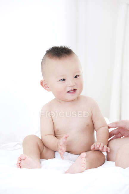 Portrait of innocent Chinese baby boy at home — Stock Photo