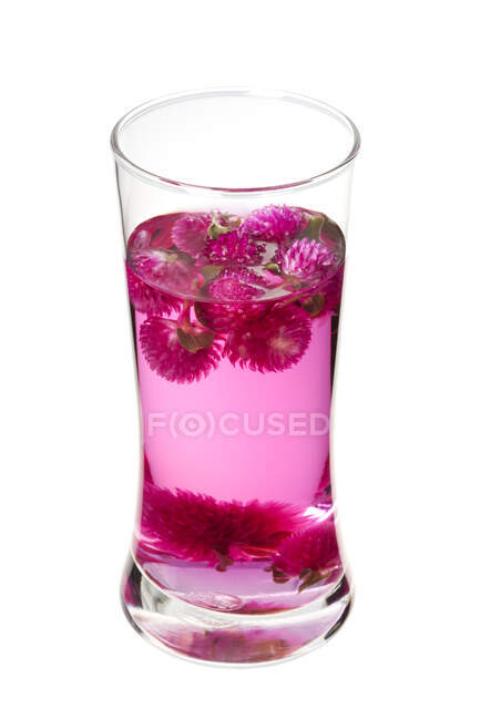 Glass of Chinese herbal tea, globe amaranth tea isolated on white background — Stock Photo