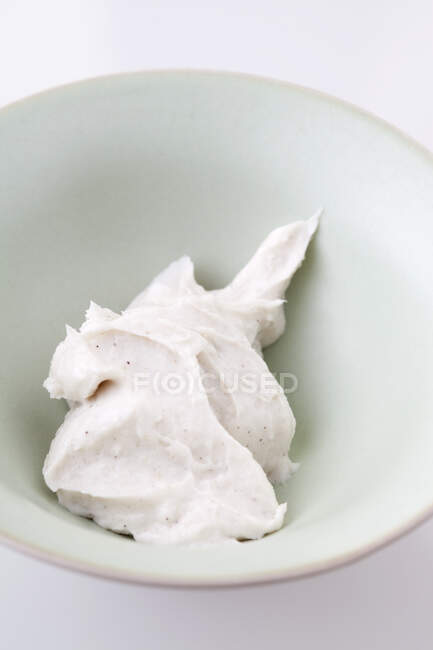 Organic herbal cream mask in a bowl — Stock Photo