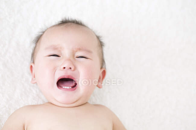 Chinese baby boy crying — Stock Photo