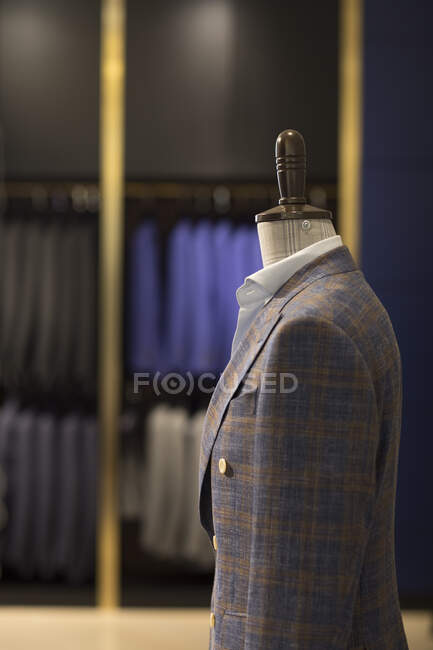Suits on display in menswear shop — Stock Photo