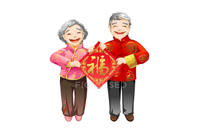 Senior couple holding Chinese New Year blessing sign — Stock Photo