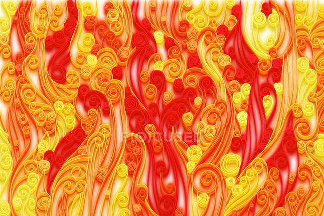 Ziermuster in den Farben rot, orange und gelb — Stockfoto