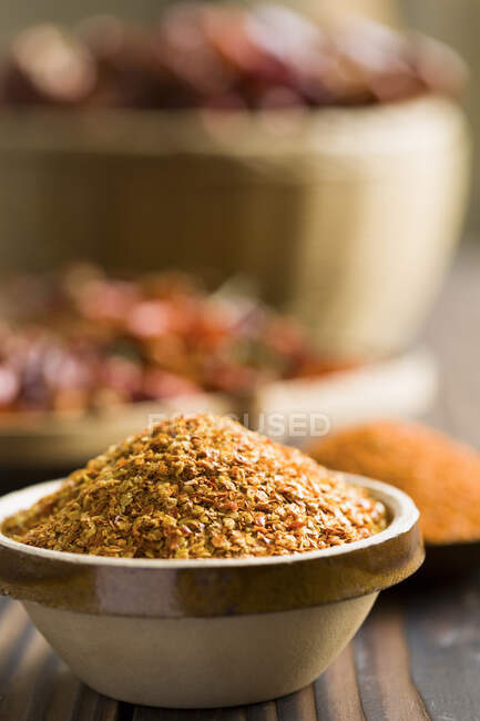 Grated Red chili peppers and seeds, close up shot — Stock Photo